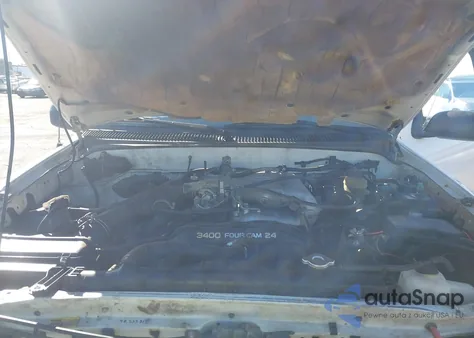 1999 Toyota Tacoma из США, поврежденный, VIN 4TAWN72N4XZ557069